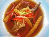 Whole Fish Cooked in Chinese Style With Pepper and Baby Corn