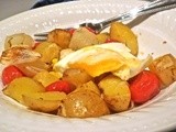 Egg over Roasted Potatoes, Turnips, Onions, and Tomatoes