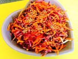 Simply colourful grated carrots with sesame seeds