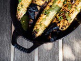 Roasted corn cobs with serrano mint sauce