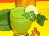 Orange spinach mint almond flax seeds smoothie