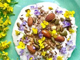 Homemade Labne with homemade dukka and edible flowers