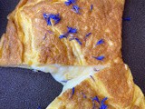 Omelette with cheese and dried cornflower petals