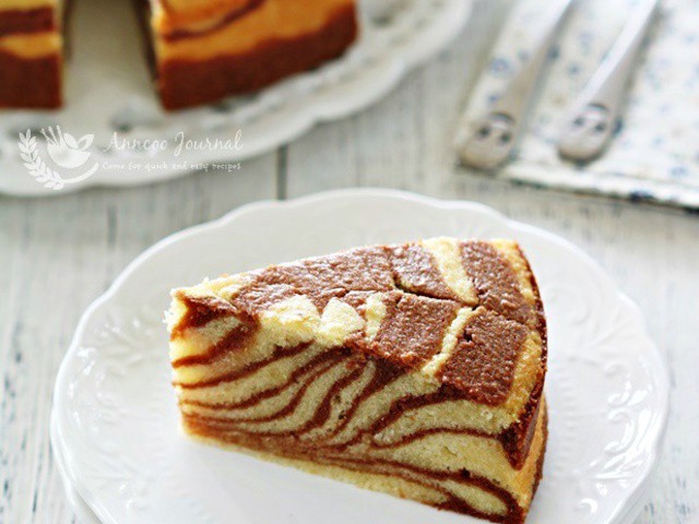 Zebra Cake with Cookies and Cream Frosting - Flavor Mosaic