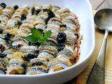 Involtini di alici al forno con patate e olive