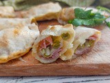 Panzerotti con pancetta e piselli