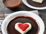 Cottage cheese and strawberry hearts on the chocolate bed