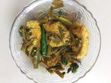 Peyajkoli Macher Jhal - Fish in mustard gravy with spring onion