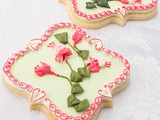 Learn to Pipe Royal Icing Flowers on a Sugar Cookie