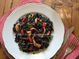 Risotto al nero con seppie- Black risotto with cuttlefish