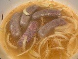 Brats precooked in beer & grilled on top of the stove