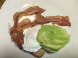Breakfast Stack-Up: poached eggs, avocado slices, wheat toast & bacon