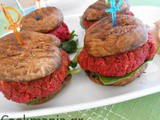 Beetroot burgers “in mushroom buns” and ketchup sauce