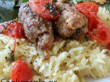 Kebab with saffron rice and cherry tomatoes