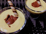 Creamy mango and yogurt cups topped with chocolate