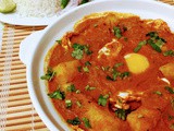 Desi style poached egg curry