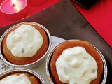 Eggless jaggery roshogolla cupcake with a yogurt pistachio topping