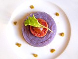 Crema di patate viola con salame da cotta , mostarda di zucca e tartufo con gocce di crema di scapi di aglio di Resia