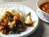Aloo Chingrir Shorshe Bata Diye Jhal (a light curry with Prawn and Potato Wedges)