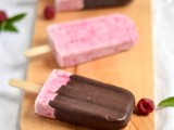 Chocolate Covered Raspberry Cheesecake Popsicles