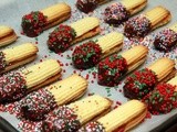 Jam sanwiched butter cookies dipped in chocolate & sprinkles!bu