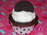 Oreo stuffed cupcakes with a marshmallow whipped cream frosting