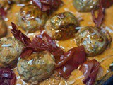 Pesto Meatballs in Sundried Tomato Sauce and Crispy Prosciutto