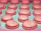 Pink macarons filled with peanut butter & jelly