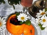 Frutti di bosco in coppa di arancia