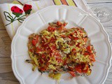 Alici al forno con patate e pomodori