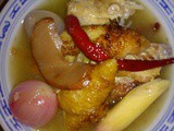 Khong assam [roasted trotter in sour soup]