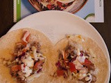 Jerk chicken tacos with mango slaw