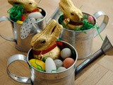 Fun for kids: Easter eggs and bunnies in miniature watering cans