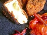 Deep- fried breaded camembert with spicy plum sauce