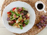 Salad with mozzarella, grapes and molasses dressing
