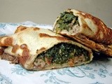 Crepes with spinach, pecans, tart cherries and gjetost cheese