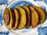 Curried crispy oven roasted potato slices