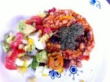 “Mediterranean” white bean “chili” with avocado corn salsa and pesto