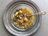 Pigeon pea soup with pearled couscous and collards