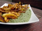 Roasted delicata squash over spinach white bean purée
