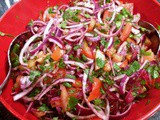 Piyaz Salad with red onions, tomatoes, parsley and sumac