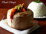 Daab Chingri Or Marinated Jumbo Prawns Cooked Inside Tender Coconut(Daab)
