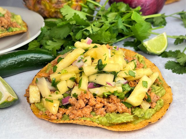 https://verygoodrecipes.com/images/blogs/prevention-rd/guacamole-and-chipotle-chicken-tostadas-with-pineapple-salsa.640x480.jpg