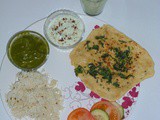 சீரக சாதம்,ஆலு பாலக்,கோவைக்காய் ராய்தா,ப்ளெயின் குல்சா,மசாலா மோர் / North Indian Veg Lunch menu