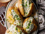 Delicious jacket potatoes with herbed cream cheese