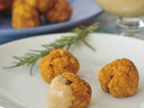 Apricot rosemary popcorn fritters with apricot cream sauce