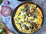 Brussels Sprouts Frittata with Arugula, Purple Potatoes, Manchego