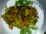 Lasooni sukha subji (dry mixed vegetables flavored with garlic)