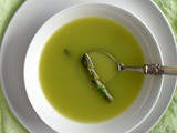 Pea and rocket consommé with asparagus