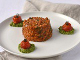 Tomato and spinach risotto with confit tomatoes and basil puree